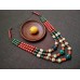 Necklace Patsyorka of ceramic beads colourful 3 threads